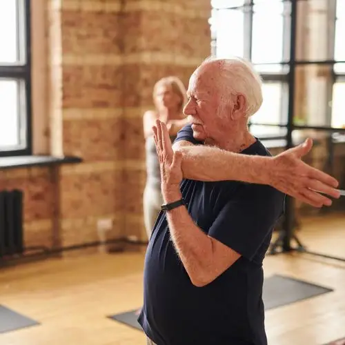 Seniors taking part in blood pressure exercises.