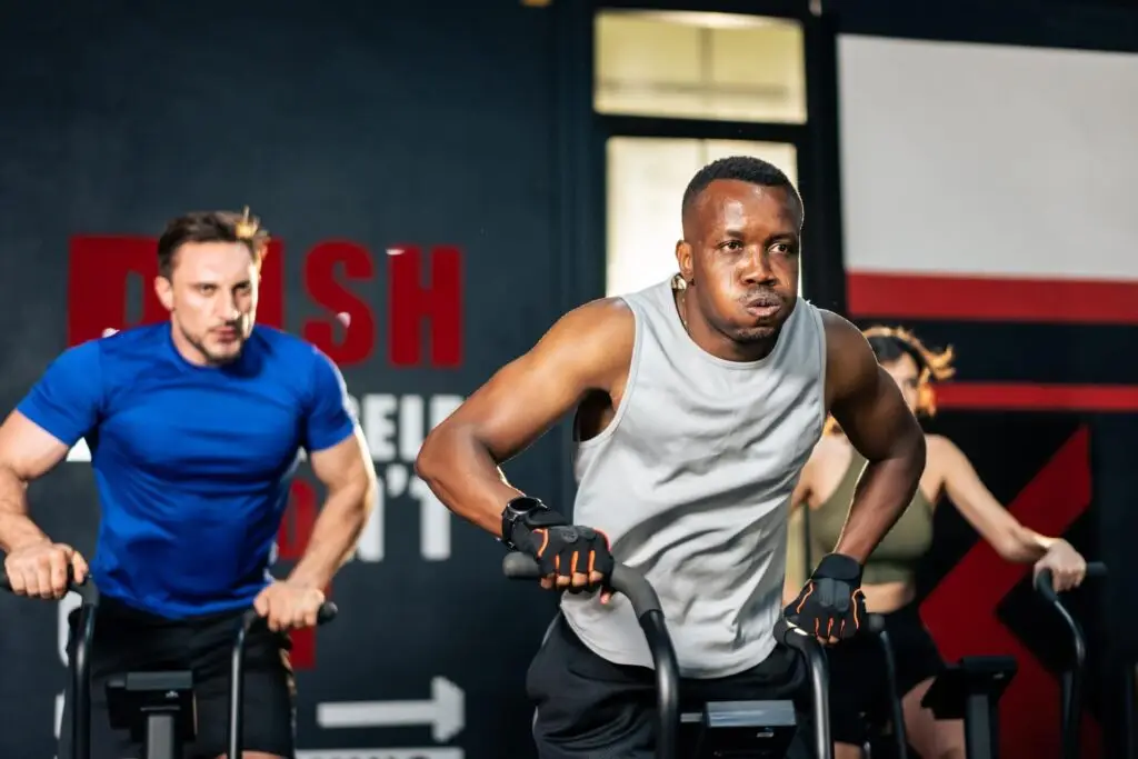 Group of people partaking in HIIT workouts | Featured Image for the HIIT Workouts – Understanding What They Are & Their Importance Blog by Pivotal Motion Physiotherapy.