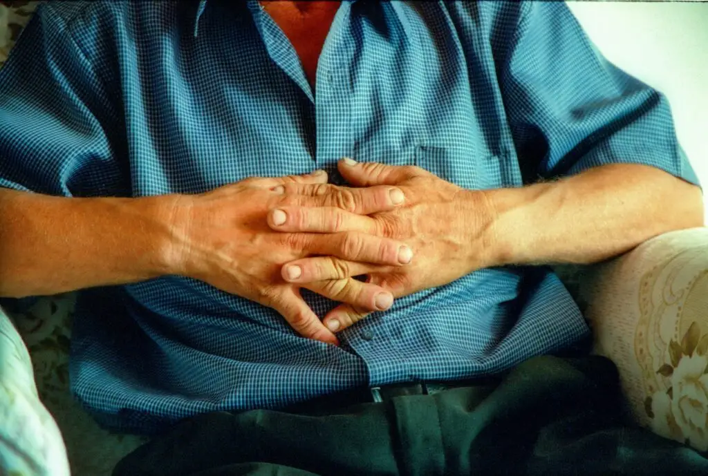 a close up shot of a an old man's hands