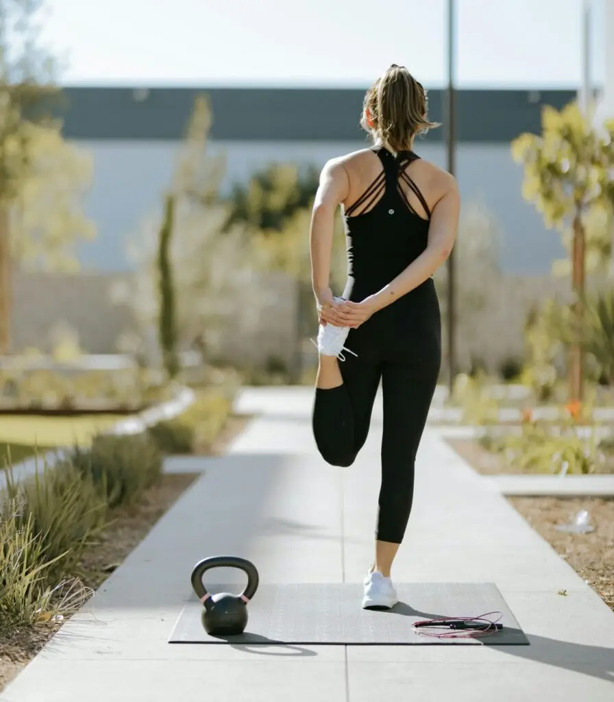 A woman stretching her legs